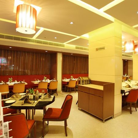 Comfort Inn Legacy Rajkot Restaurant billede