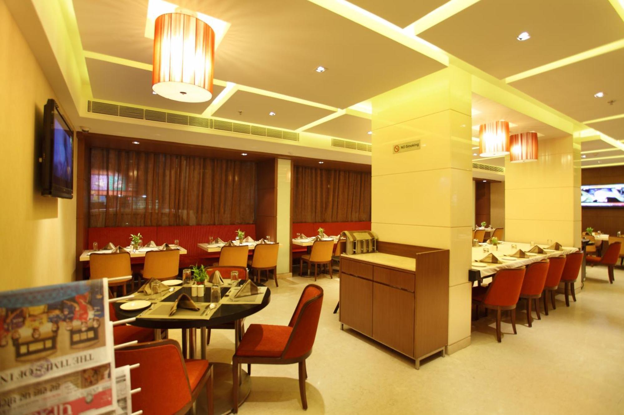 Comfort Inn Legacy Rajkot Restaurant billede